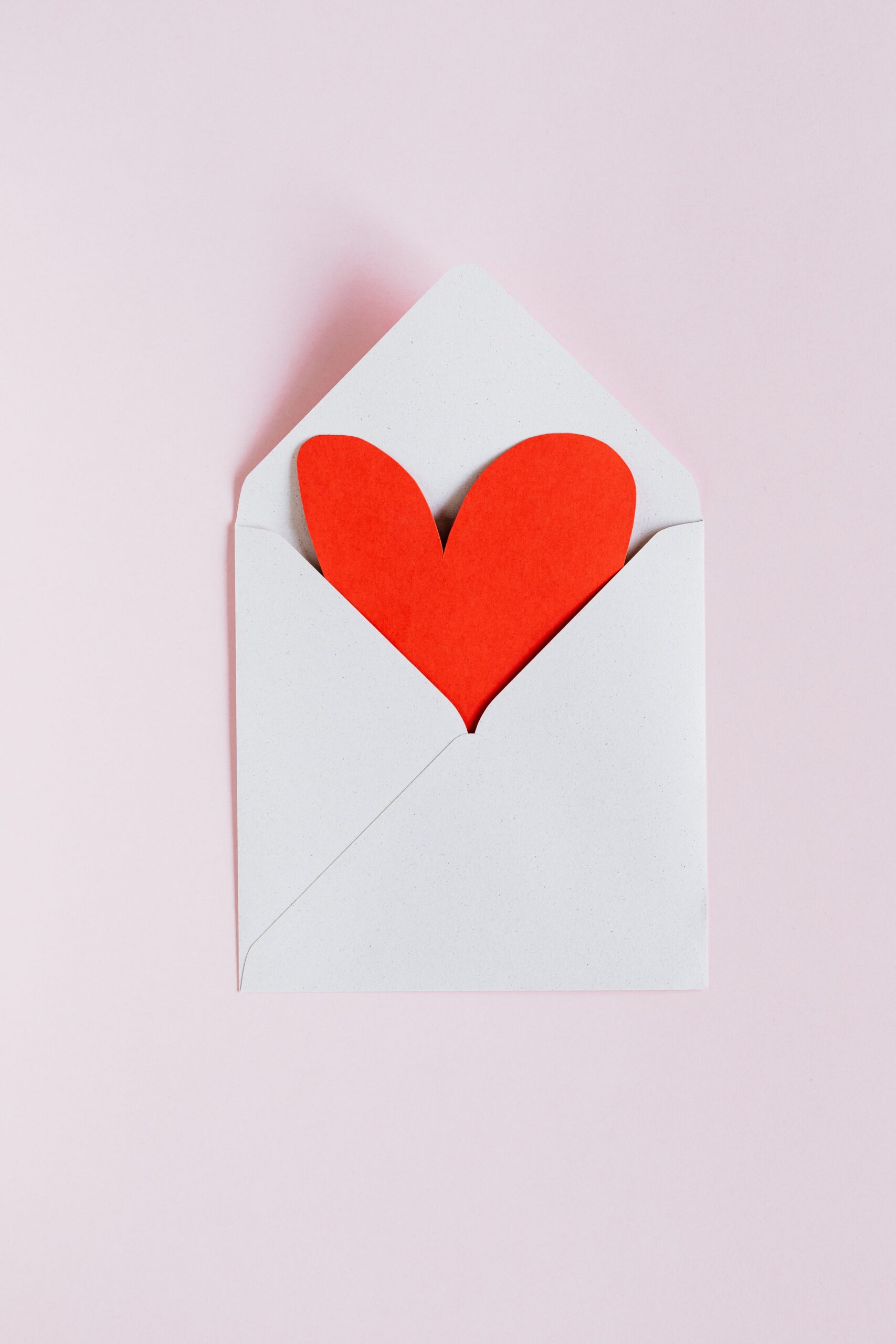 red heart in envelope